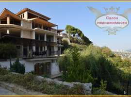 Продажа недостроеного дома в Гурзуфе с большим земельным участком....