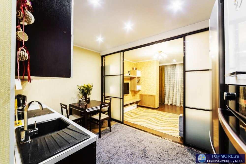 Продаю квартиру с ремонтом и мебелью в самом центре Сочи. Комплекс бизнес класса с магазинами, кафе, пекарней,... - 1