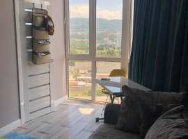 Квартира с шикарным панорамным видом на горы и город в самом центре...