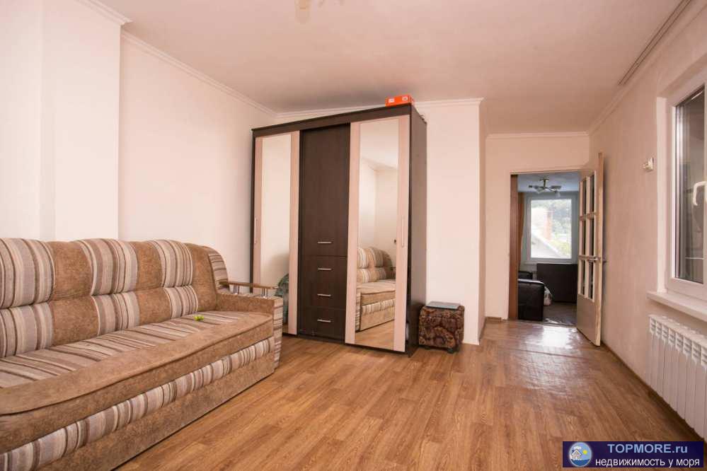 Продается квартира в частном доме, 23 м2 с придомовой территорией. 2 комнаты, кухня-столовая, 2 санузла.  Удобный... - 1