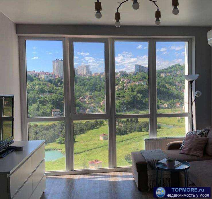 Лот № 166394. Продается видовая квартира-студия в центре Сочи в жк Раз два три. Студия общей площадью 42 м2,...