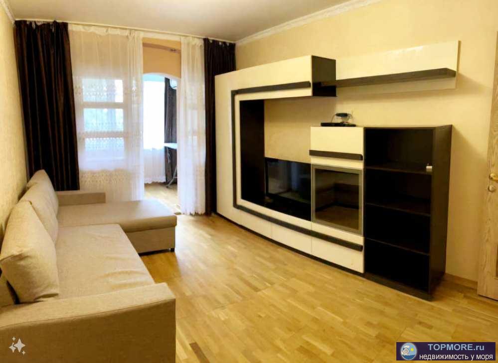 Лот № 178613. Продаётся просторная двухкомнатная квартира в Адлере. Площадь — 51м². Из окон и лоджии открывается... - 1