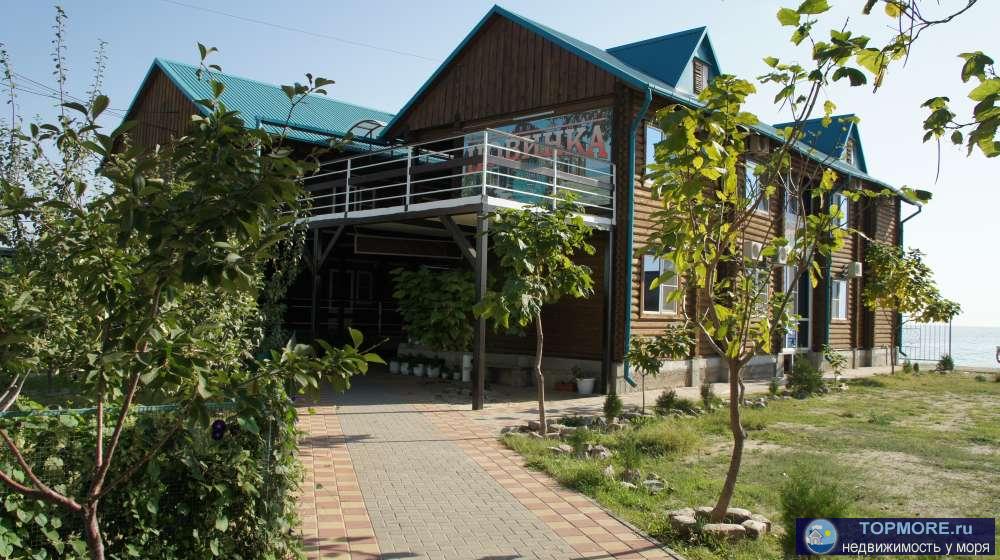 Продаю действующую гостиницу на берегу Азовского моря на 20 номеров. Сруб с оцилиндрованного бревна. Море в 10 мерах.... - 1