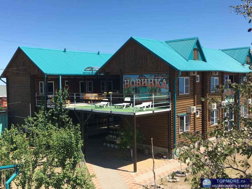 Продаю действующую гостиницу на берегу Азовского моря на 20 номеров. Сруб с оцилиндрованного бревна. Море в 10 мерах.... - 10