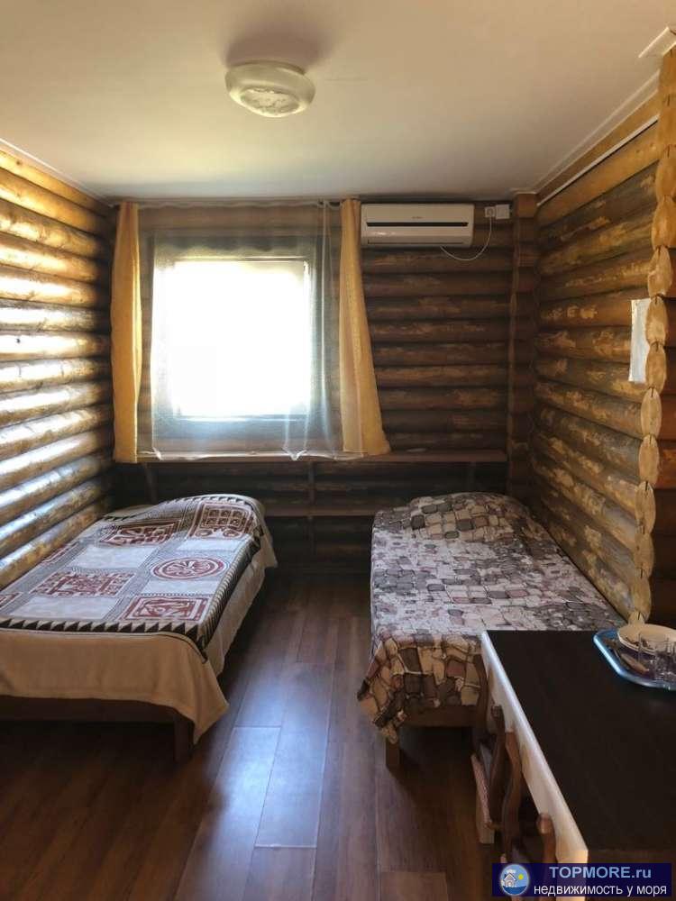 Продаю действующую гостиницу на берегу Азовского моря на 20 номеров. Сруб с оцилиндрованного бревна. Море в 10 мерах.... - 3