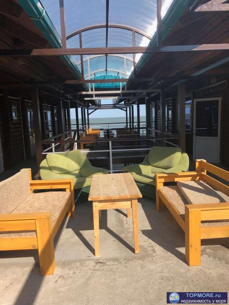 Продаю действующую гостиницу на берегу Азовского моря на 20 номеров. Сруб с оцилиндрованного бревна. Море в 10 мерах.... - 5