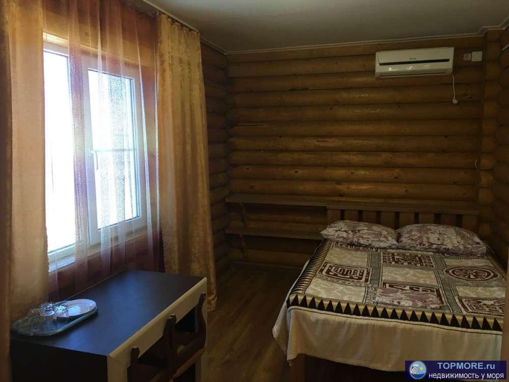 Продаю действующую гостиницу на берегу Азовского моря на 20 номеров. Сруб с оцилиндрованного бревна. Море в 10 мерах.... - 9