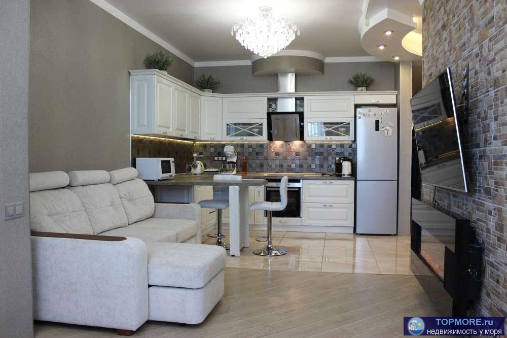 Краткое описание     Общая площадь 99 кв.м, площадь кухни-гостиной 34 кв.м, площадь комнат 18+20 кв.м. Раздельный...