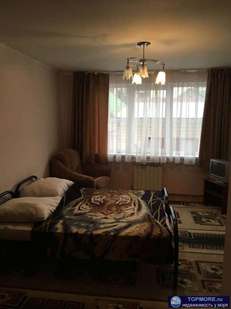 В курортном поселке Лазаревское от моря в 400 м.  продается четырех этажный дом, минигостиница   от вокзалов 5 мин....