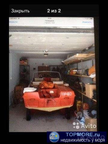 Гараж в цокольном этаже многоквартирного дома. Проведена вода, электро ворота, встроенные стеллажи.Реальному... - 1