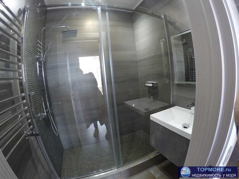 Продается квартира с дизайнерским ремонтом в новом кирпичном доме в Анапе  Площадь (общ\жил\кухня): 61.68/34.49/12.73... - 4