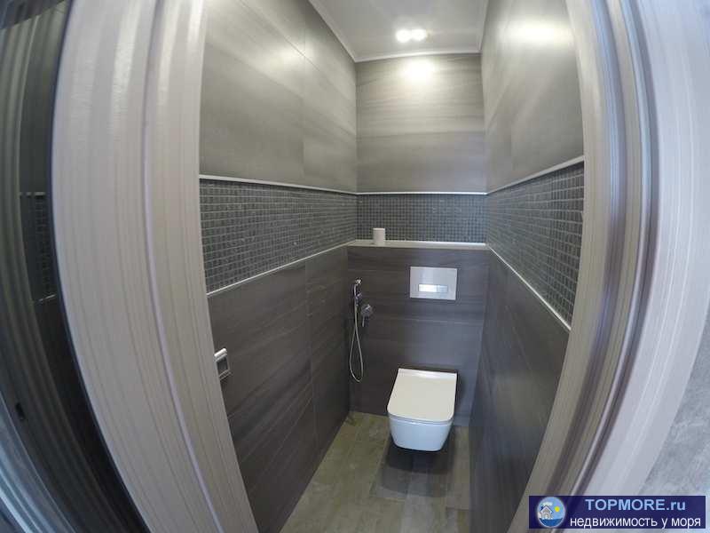 Продается квартира с дизайнерским ремонтом в новом кирпичном доме в Анапе  Площадь (общ\жил\кухня): 61.68/34.49/12.73... - 6